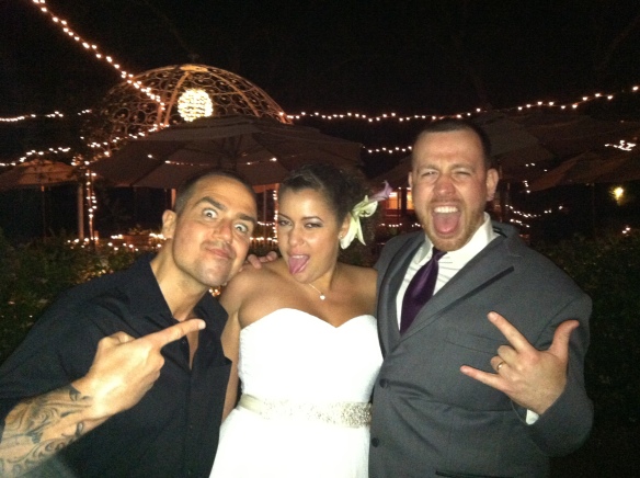 Rockstar photo with bride and groom