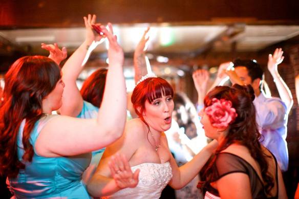 bride and friends rocking the dancefloor